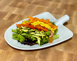 colorful medley of grilled 'n' chilled seasonal vegetables served on a bed of garden greens, tossed in our house herb vinaigrette